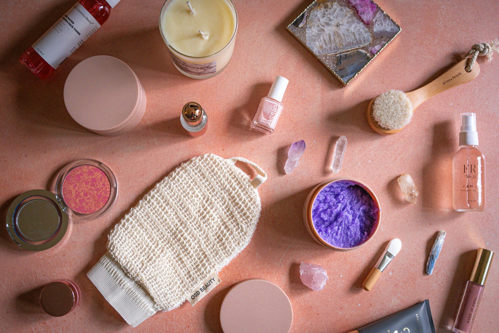 Flat lay of skincare and makeup, visual shorthand for concern-led beauty searches and AI answers over product grids