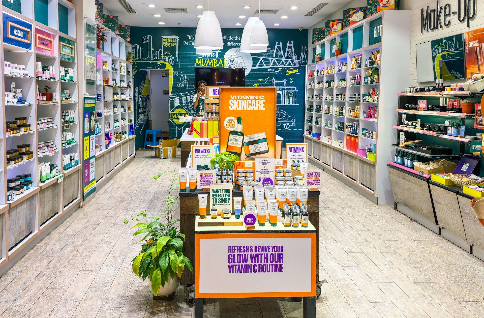 Bright cosmetics store shelves—visual shorthand for in-aisle product comparison and slow compare UX online